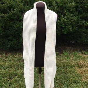 Oversized cream sleeveless cardigan for extra warm